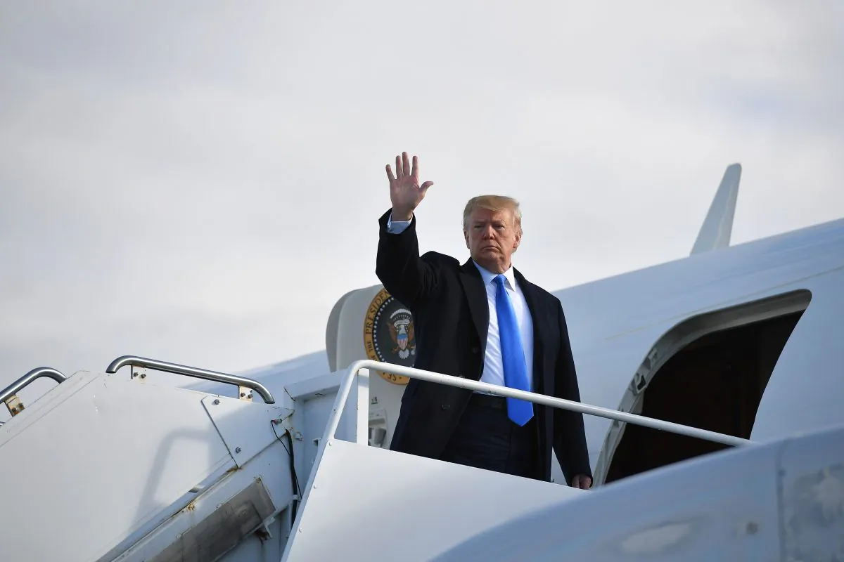 President Donald Trump waves before boarding Air Force One at Shannon Airport in Shannon, Ireland, on June 6, 2019. (MANDEL NGAN/AFP/Getty Images)