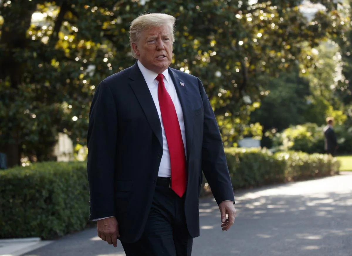 President Donald Trump talks with reporters before departing on Marine One, in Washington, on May 30, 2019. (Evan Vucci/AP Photo)