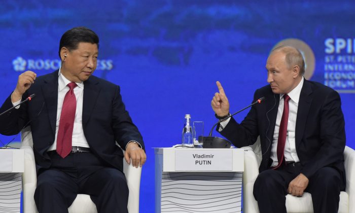 Chinese leader Xi Jinping and Russian President Vladimir Putin attend the St. Petersburg International Economic Forum in
St. Petersburg on June 7, 2019. (Olga Maltseva/AFP/Getty Images)