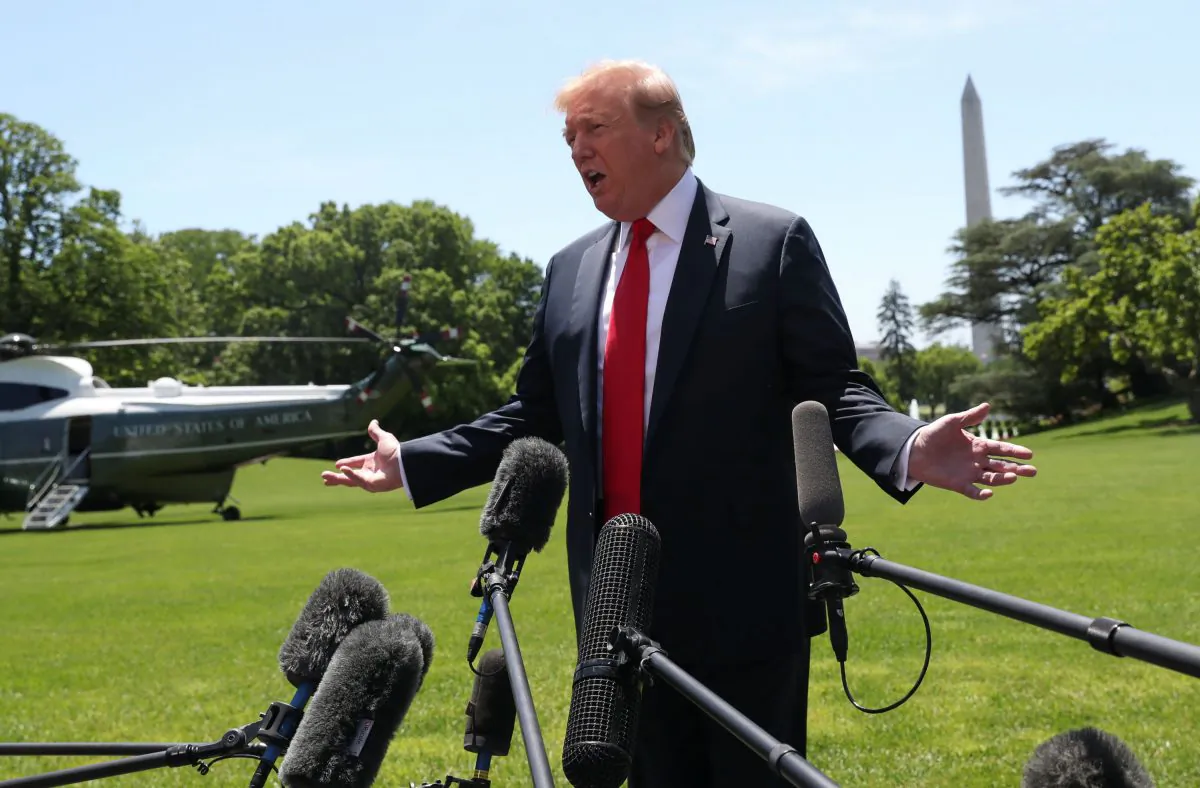 U.S. President Donald Trump talks to reporters as he departs for travel to Japan from the White House in Washington on May 24, 2019. (Reuters/Leah Millis)