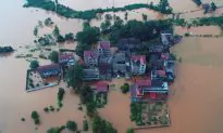 Thousands Stranded, Five killed, as Heavy Rain Lashes South China