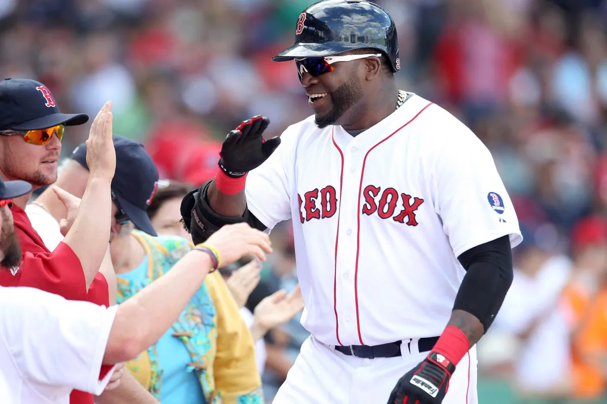 Boston Red Sox designated hitter David Ortiz celebrates his solo home in the sixth inning against the Toronto Blue Jays during their MLB American League East baseball game in Boston, Massachusetts, Sept. 22, 2013. (Dominick Reuter/Reuters)