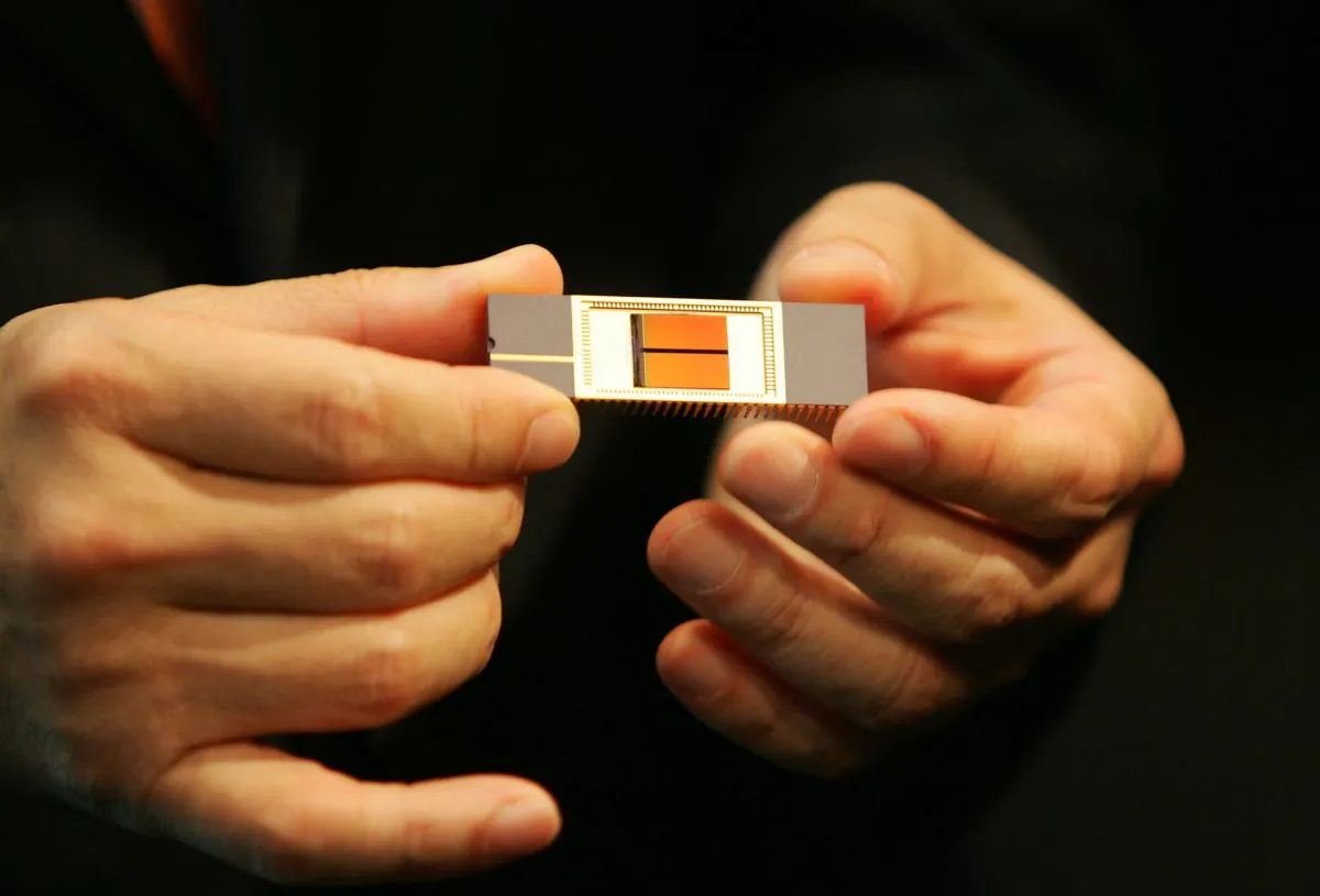 A 32-Gigabite NAND memory chip is displayed at a news conference at the Shilla hotel in Seoul, South Korea, on September 11, 2006. (Chung Sung-Jun/Getty Images)