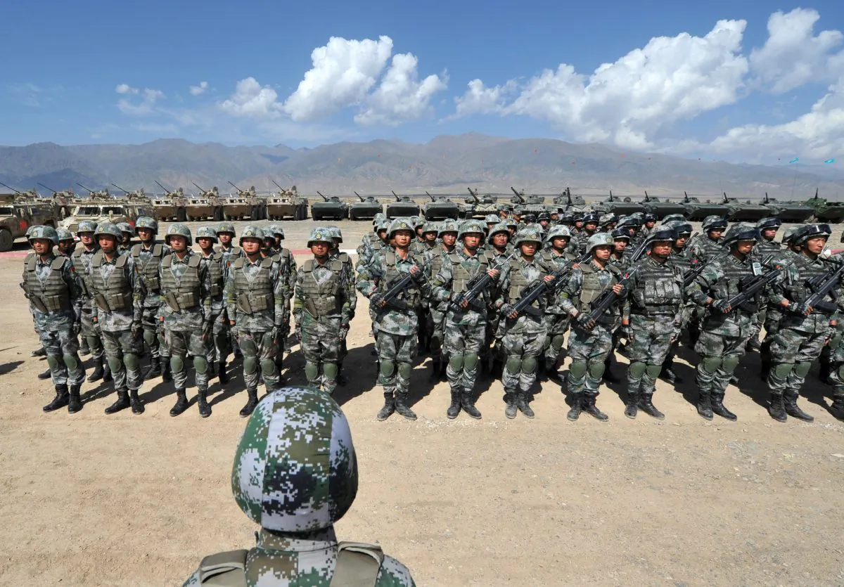 Chinese soldiers stand at attention during Peace Mission-2016 joint military exercises of the Shanghai Cooperation Organization (SCO) in Balykchy, Kyrgyzstan, on Sept. 19, 2016. The joint antiterrorism drill involves more than 1,100 troops from Russia, Kazakhstan, Kyrgyzstan, Tajikistan, Uzbekistan, and China as members of the Shanghai Cooperation Organization. (VYACHESLAV OSELEDKO/AFP/Getty Images)