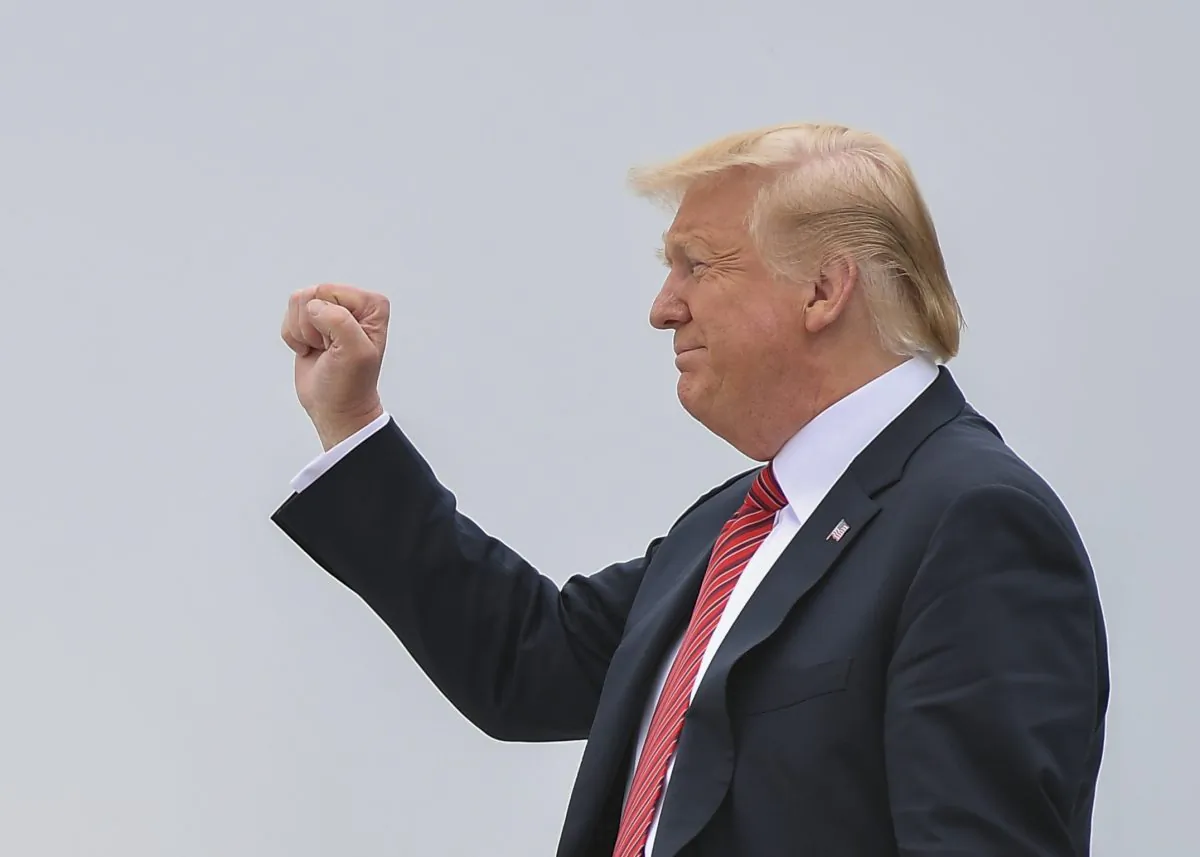President Donald Trump gestures as he steps off Air Force One at Offutt Air Force Base, Neb., on June 11, 2019. (Mandel Ngan/AFP/Getty Images)