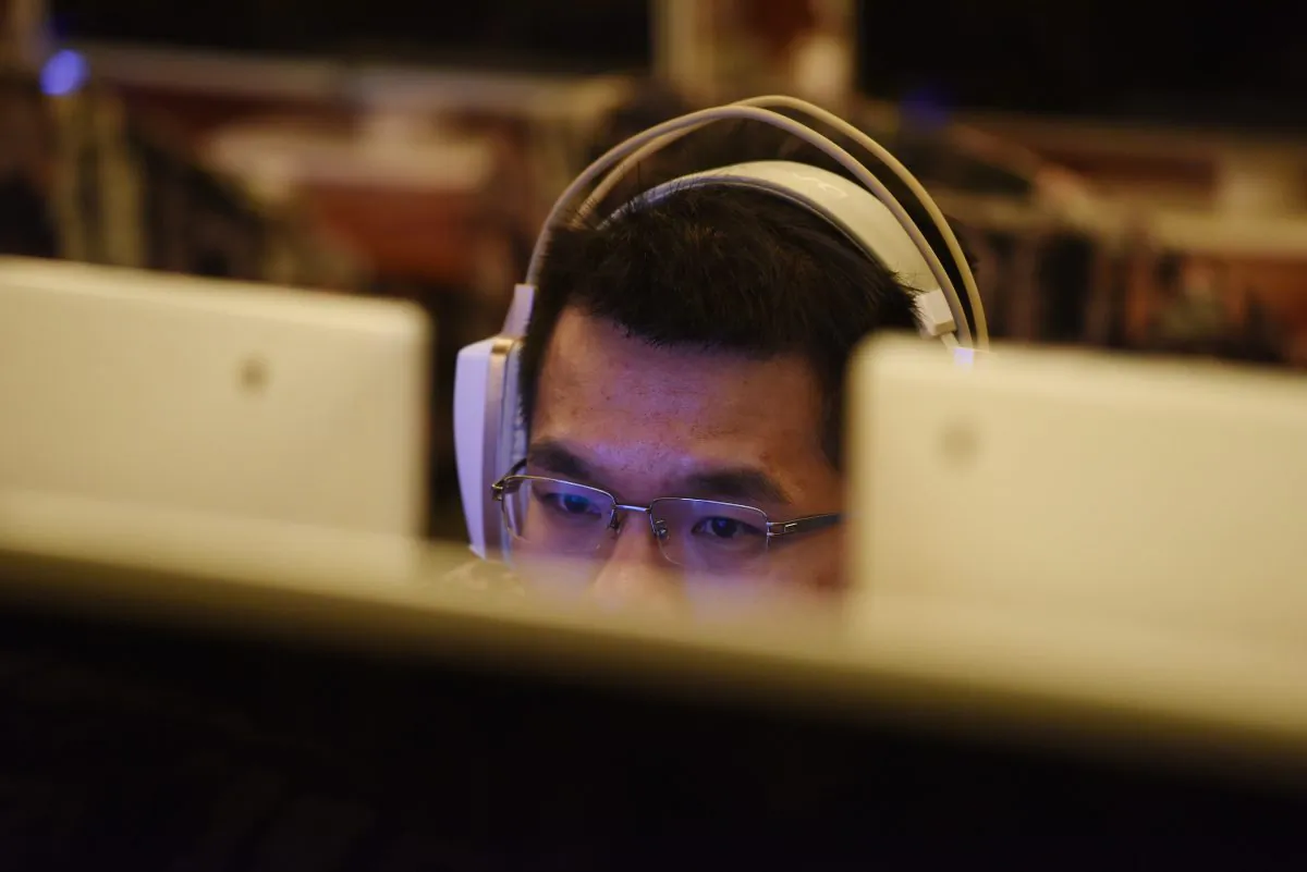 A man uses a computer in an internet cafe in Beijing, China, on June 1, 2017.
(Greg Baker/AFP/Getty Images)