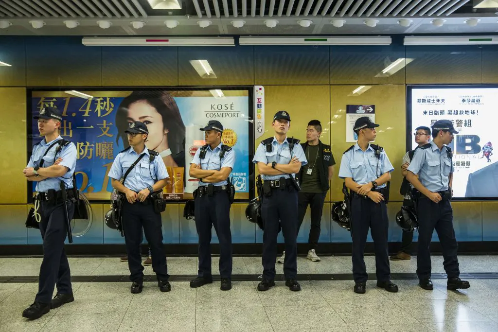 Police stand guard inside Admiralty MTR station in Hong Kong on June 11, 2019. (Isaac Lawrence/AFP/Getty Images)