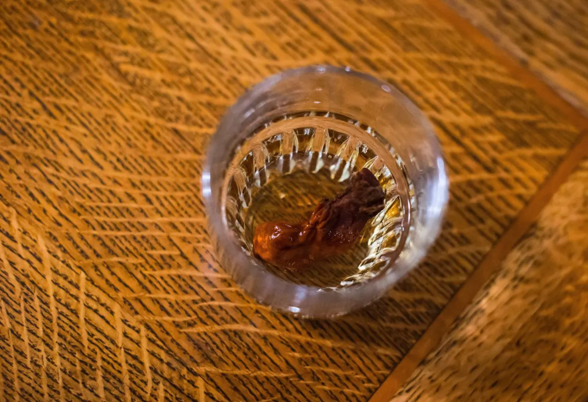 The Sourtoe Cocktail, a shot of whisky with a dehydrated human toe in the drink, is seen at the Downtown Hotel, in Dawson City, Yukon, on July 1, 2018. (Darryl Dyck/The Canadian Press)