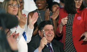 Illinois Governor Signs Law Expanding Access to Abortion