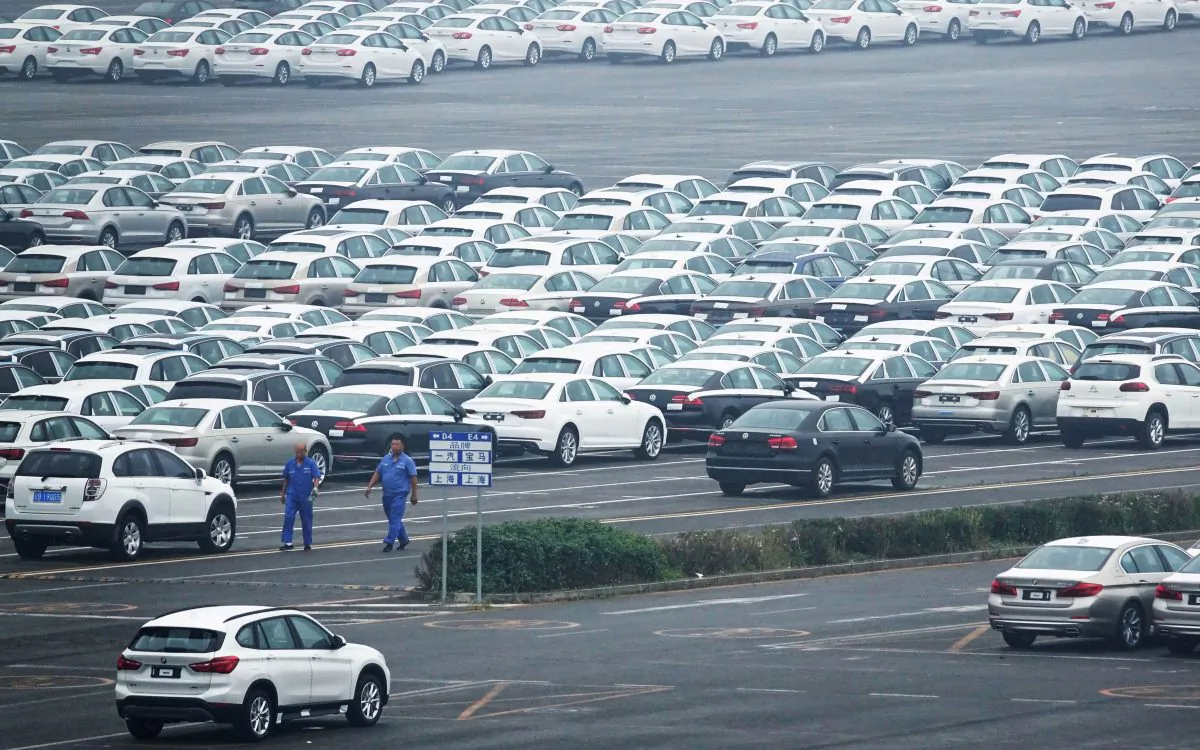 Newly manufactured cars are seen at the automobile terminal in the port of Dalian, Liaoning Province, China on July 9, 2018. (Reuters)