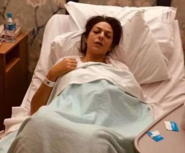 Nicole Elkabbas in bed