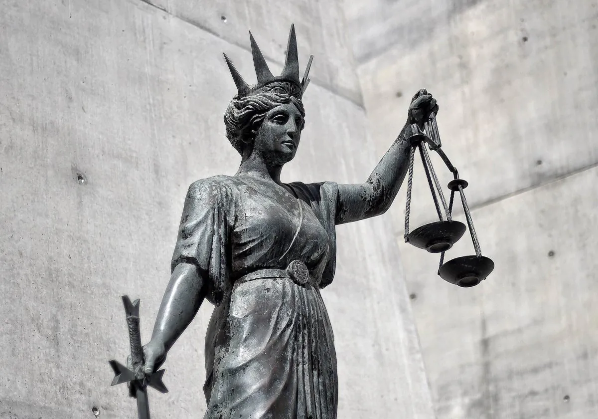 A statue of Themis, the Greek God of Justice stands outside the Supreme Court in Brisbane, Australia. (Dave Hunt/AAP Image)