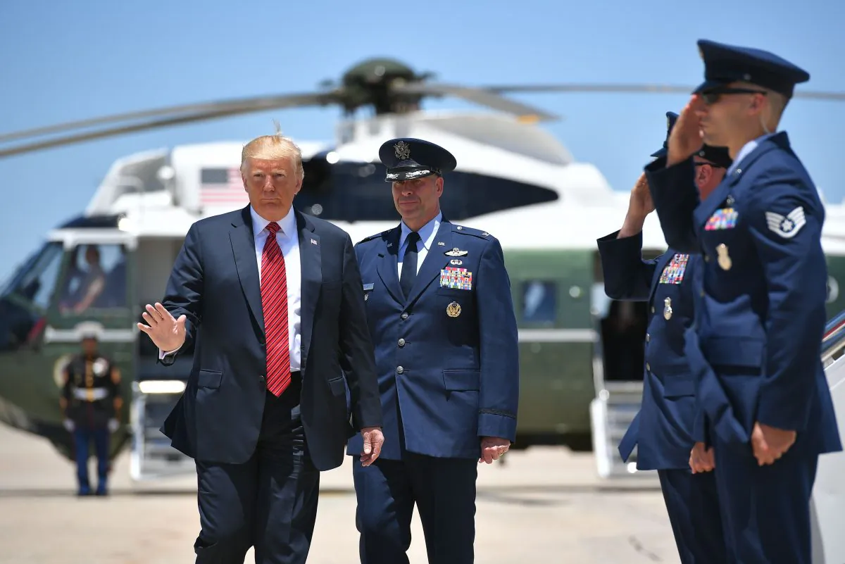 President Donald Trump boards Air Force One before departing from Andrews Air Force Base in Maryland on June 11, 2019. (Mandel Ngan/AFP/Getty Images)