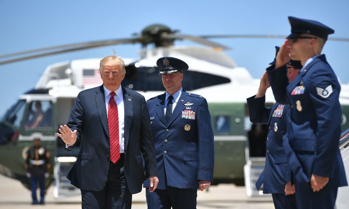 President Donald Trump boards Air Force One before departing from Andrews Air Force Base in Maryland on June 11, 2019. (Mandel Ngan/AFP/Getty Images)