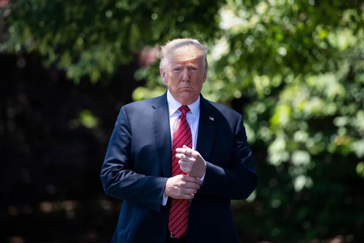 President Donald Trump walks out of the Oval Office to speak with reporters at the White House on June 11, 2019. (Jim Watson/AFP/Getty Images)