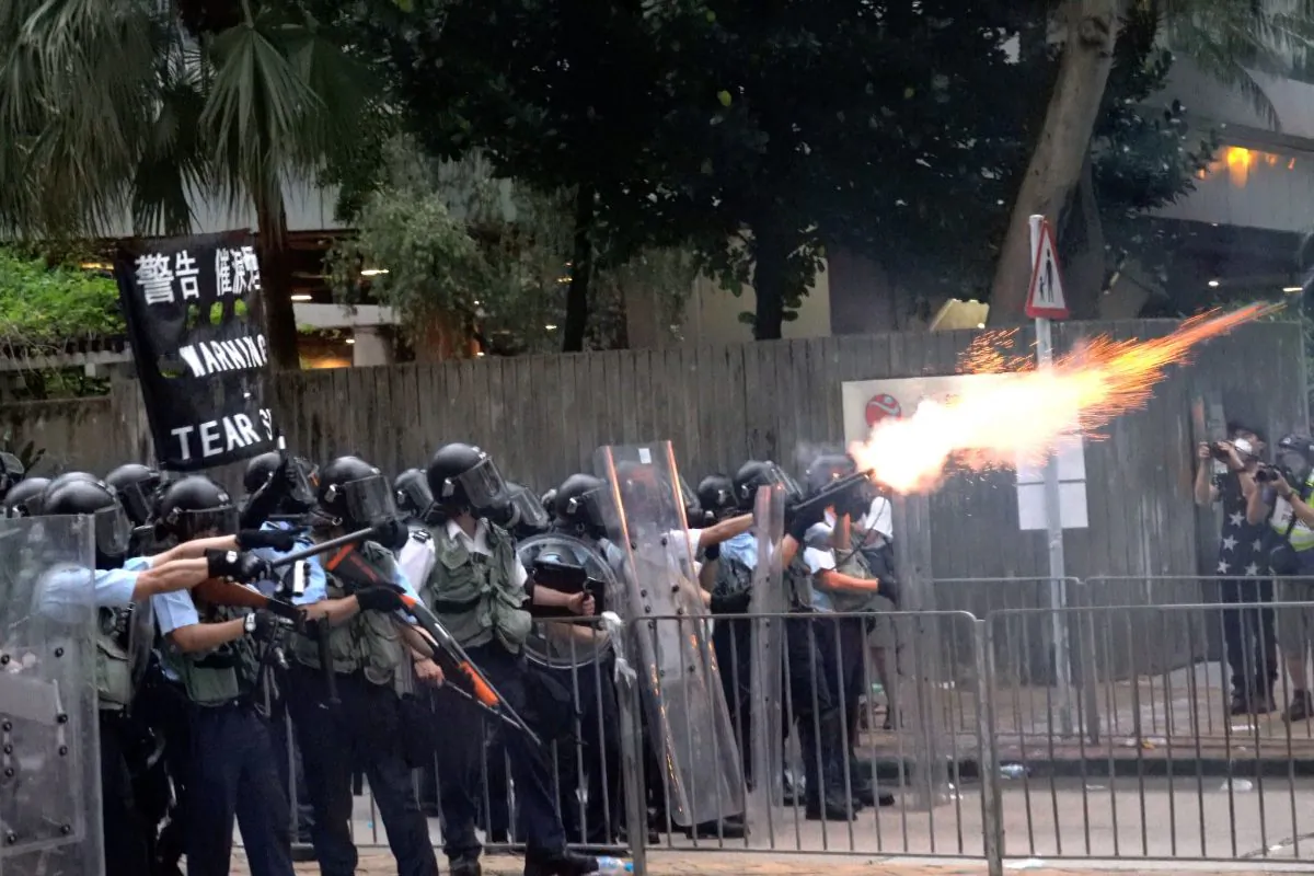 Hong Kong police fired off tear gas at the protesters at the Admiralty Centre in Hong Kong, on June 12, 2019. (Li Yi/The Epoch Times)