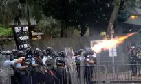 Behind the Violent Suppression of Hong Kong Protest: Carrie Lam Is a Puppet Ruler