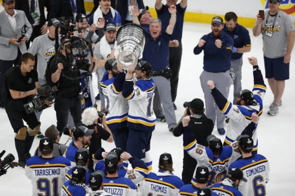 St. Louis Blues players pose for a team photo with the Stanley Cup after defeating the Boston Bruins in game seven of the 2019 Stanley Cup Final at TD Garden on June 12, 2019. (Winslow Townson-USA TODAY Sports/Reuters)
