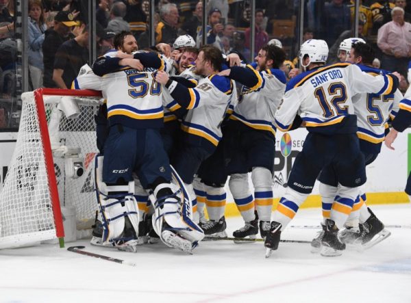 St. Louis Blues players pose for a team photo with the Stanley Cup after defeating the Boston Bruins in game seven of the 2019 Stanley Cup Final at TD Garden on June 12, 2019. (Winslow Townson-USA TODAY Sports/Reuters)