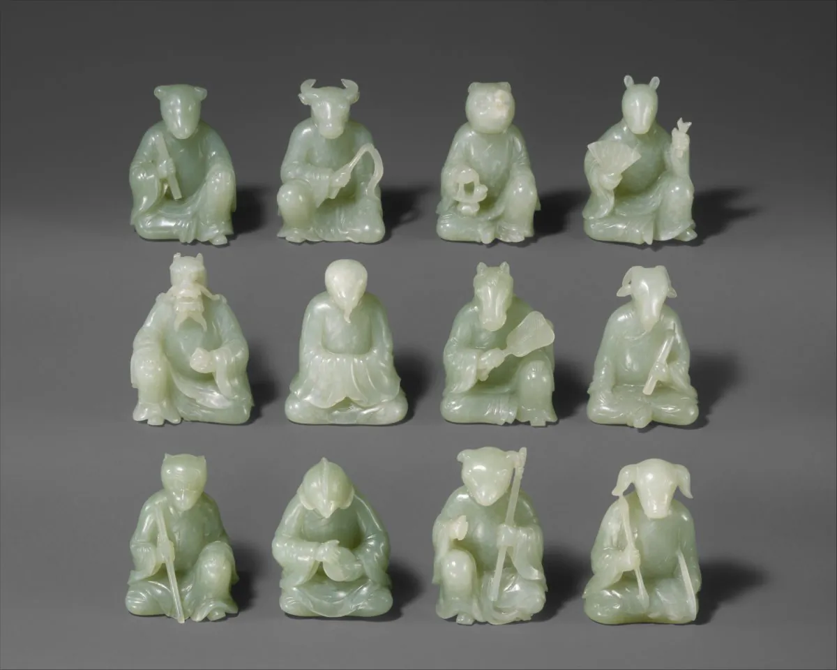 This set of 12 animals of the Chinese zodiac, Qing Dynasty : (L–R for each row) the rat, ox, tiger, rabbit, dragon, snake, horse, ram, monkey, rooster, dog, and pig are carved from flawless pale green jade. Gift of Heber R. Bishop, 1902. (The Metropolitan Museum of Art)