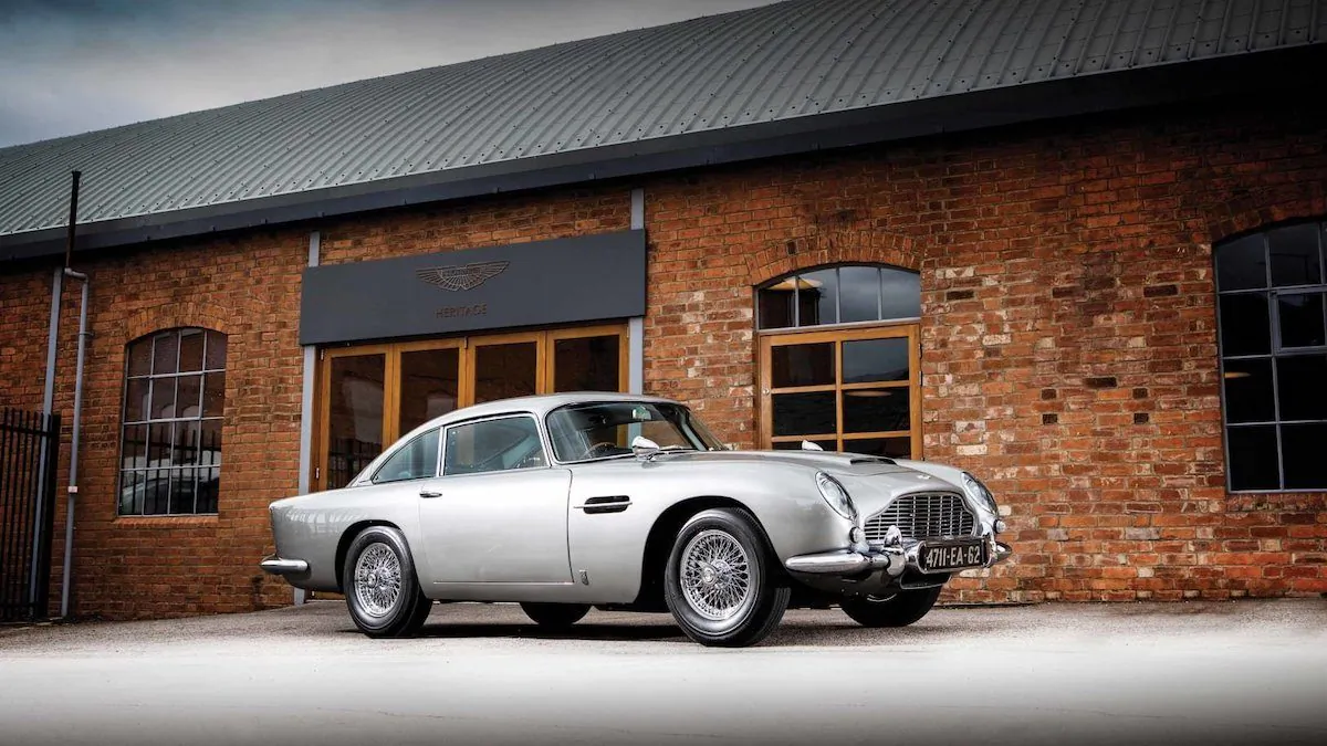 A fully restored version of the Aston Martin DB5, made famous by suave spy James Bond in the 1964 film "Goldfinger," is going up for auction. (CNN)