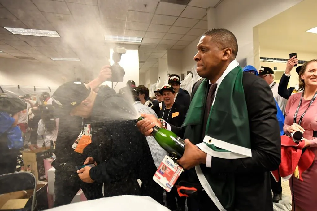 Toronto Raptors President Masai Ujiri celebrates defeating the Golden State Warriors and winning the Larry O'Brien NBA Championship Trophy after Game 6 basketball action in Oakland, Calif. on June 13, 2019. (Frank Gunn/The Canadian Press)