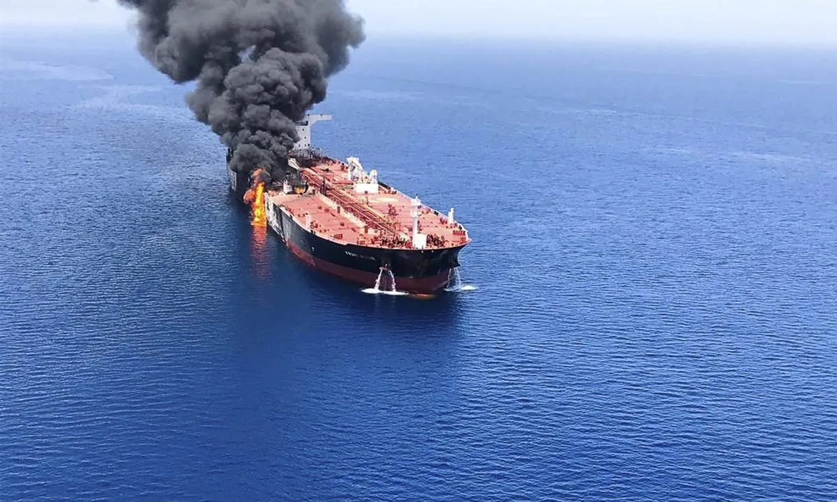 An oil tanker is on fire in the sea of Oman, on June 13, 2019. Two oil tankers near the strategic Strait of Hormuz were reportedly attacked on Thursday, an assault that left one ablaze and adrift as sailors were evacuated from both vessels and the U.S. Navy rushed to assist amid heightened tensions between Washington and Tehran. (ISNA/AP Photo)