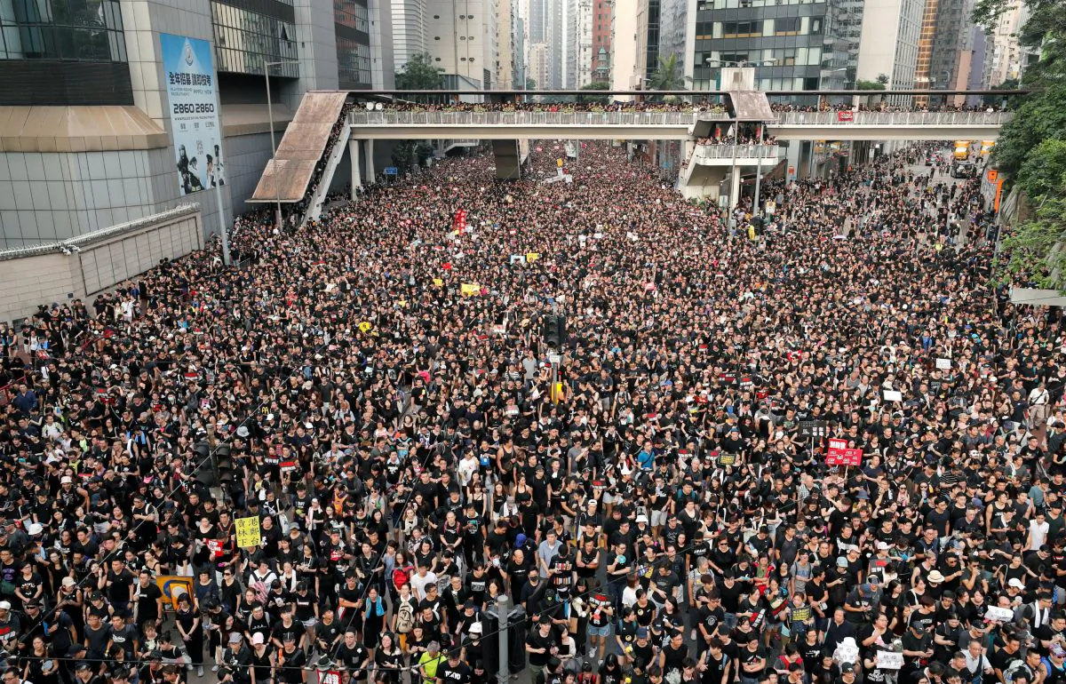 Protesters attend a demonstration demanding Hong Kong's leaders to step down and withdraw the extradition bill, in Hong Kong on June 16, 2019. (Reuters/Tyrone Siu)