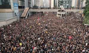 'Sea of Black' Hong Kong Protesters Demand Leader Step Down