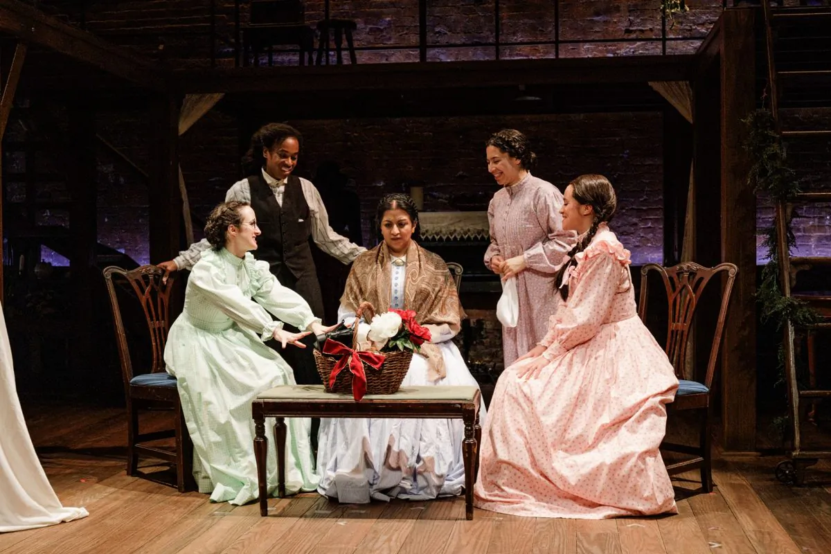 The March family: (L–R) Meg (Kate Hamill), Jo (Kristolyn Lloyd), Marmie (Maria Elena Ramirez), Beth (Paola Sanchez Abreu), and Amy (Carmen Zilles) in Primary Stages' production of Kate Hamill's “Little Women.” (James Leynse)