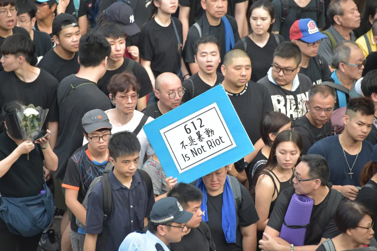 Protesters gathered in hundreds of thousands on Hong Kong streets in protest of the proposed extradition bill, demanding it to be withdrawn, on June 16, 2019. (Weili Guo/The Epoch Times)