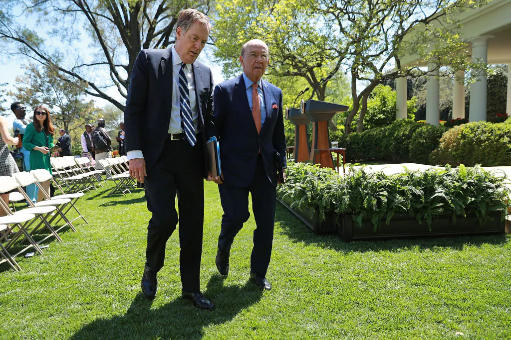 Trade Representative Robert Lighthizer (L) and Commerce Secretary Wilbur Ross leave the Rose Garden following a joint news conference with President Donald Trump and Nigerian President Muhammadu Buhari at the White House in Washington, on April 30, 2018. (Chip Somodevilla/Getty Images)