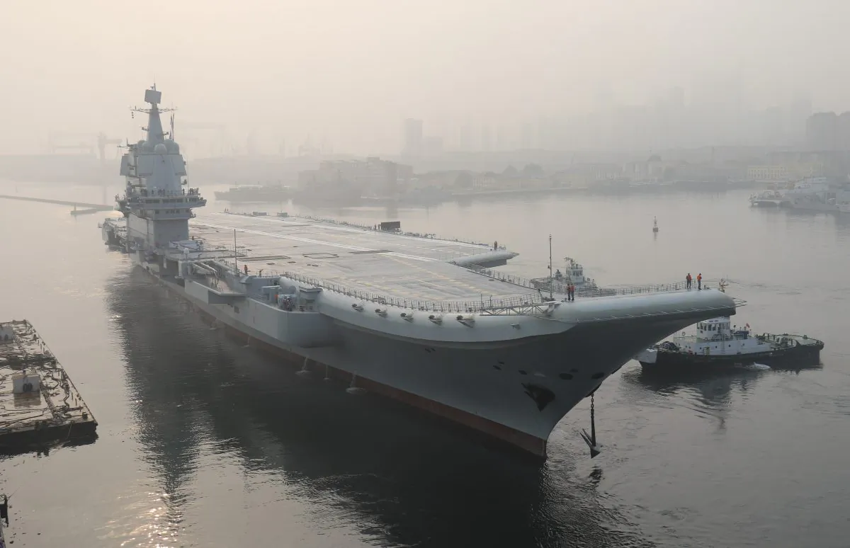 China's first domestically manufactured aircraft carrier, known only as "Type 001A", leaves port in the northeast city of Dalian early on May 13, 2018. AFP/Getty Images
