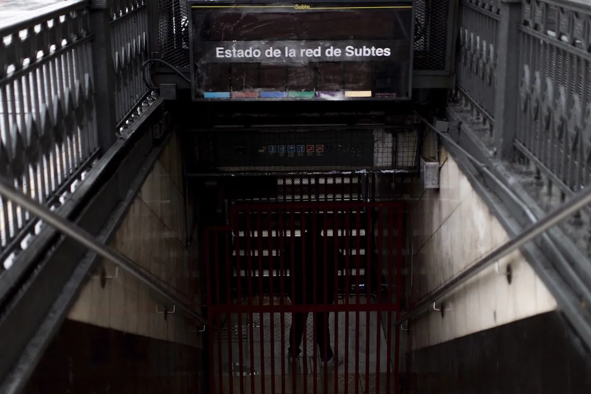 A subway employee stands in the closed entrance off Buenos Aires’s Subway during the blackout, in Buenos Aires, Argentina, Sunday, June 16, 2019. (Tomas F. Cuesta/AP Photo)