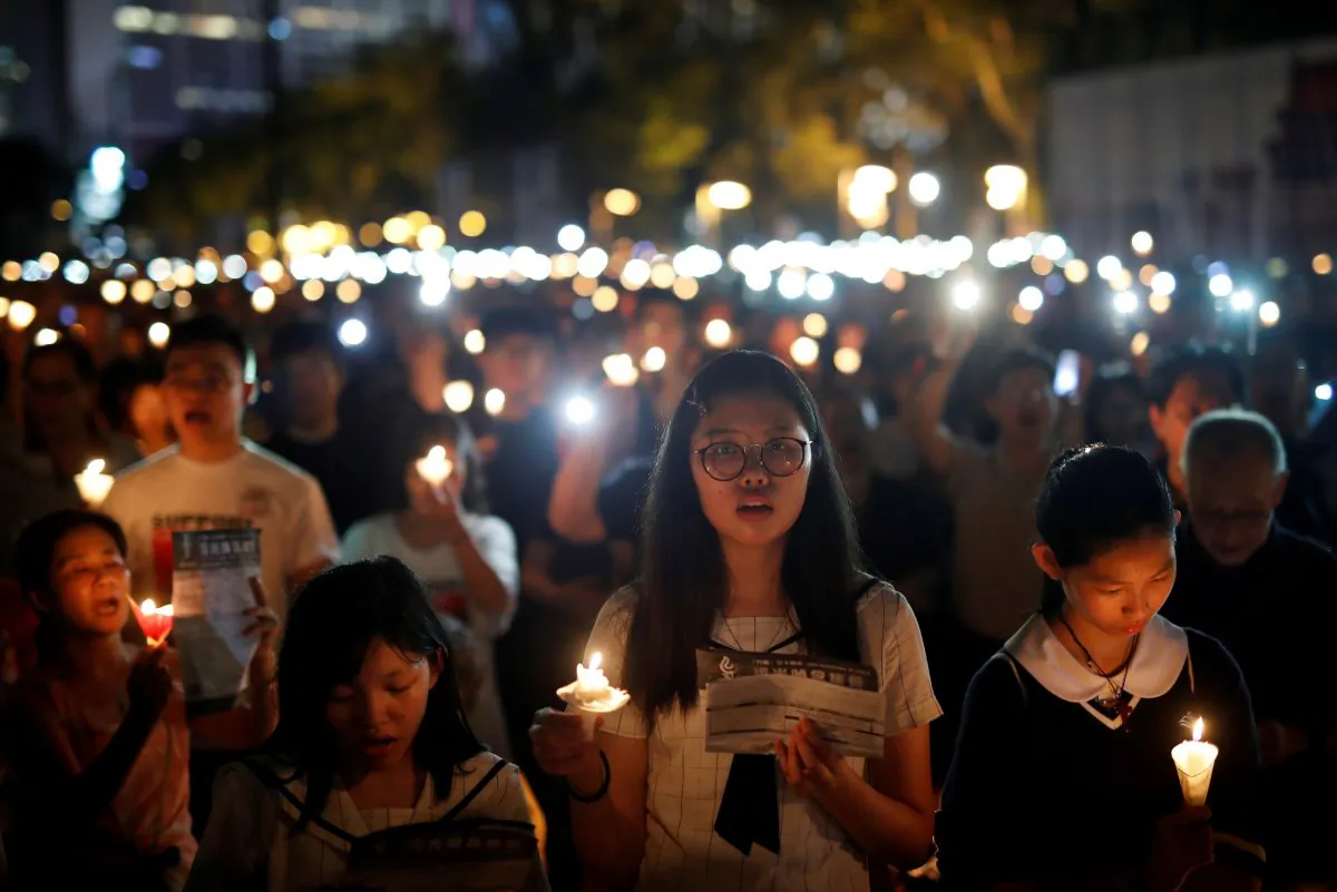 Thousands of people take part in a candlelight vigil to mark the 30th anniversary of the crackdown of pro-democracy movement at Beijing's Tiananmen Square in 1989, at Victoria Park in Hong Kong, China on June 4, 2019. (Tyrone Siu/Reuters)
