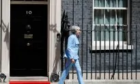 British PM Addresses Hong Kong Protests with Chinese Official During Meeting