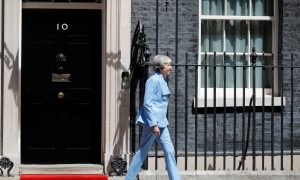 British PM Addresses Hong Kong Protests with Chinese Official During Meeting