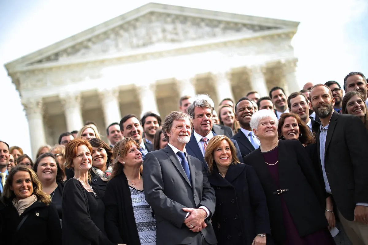 Conservative Christian baker Jack Phillips (C) and members of his family and legal team pose for photographs in front of the Supreme Court after the court heard the case Masterpiece Cakeshop v. Colorado Civil Rights Commission in Washington, D.C., on Dec. 5, 2017. (Chip Somodevilla/Getty Images)