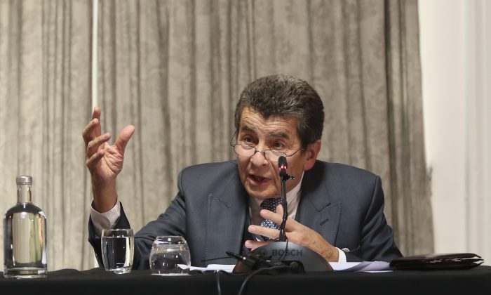 Sir Geoffrey Nice QC, chair of the China Tribunal, delivers the tribunal's judgment in London on June 17, 2019. (Justin Palmer)
