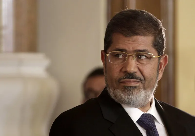 Egyptian President Mohammed Morsi holds a news conference with Tunisian President Moncef Marzouki, at the Presidential palace in Cairo, Egypt on July 13, 2012. (Maya Alleruzzo/File Photo via AP)