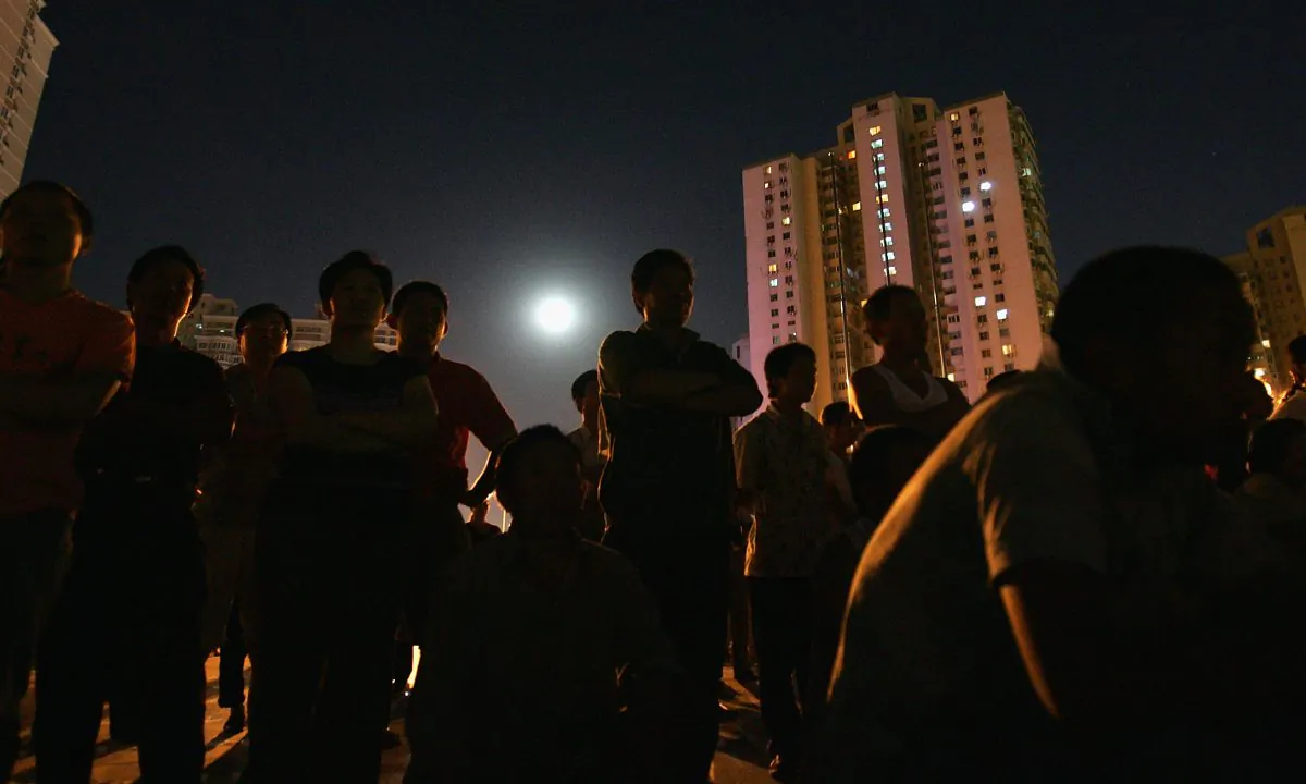 People at a housing district in China. (Guang Niu/Getty Images)