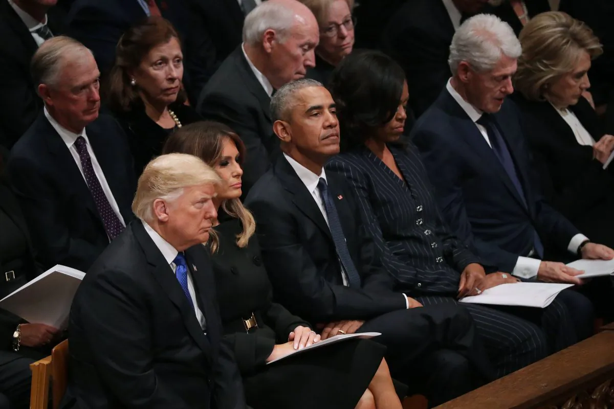 Then-President Donald Trump and then-first lady Melania Trump, former President Barack Obama, Michelle Obama, former President Bill Clinton, Hillary Clinton, (2nd Row L-R) at the National Cathedral December 05, 2018 in Washington. (Chip Somodevilla/Getty Images)