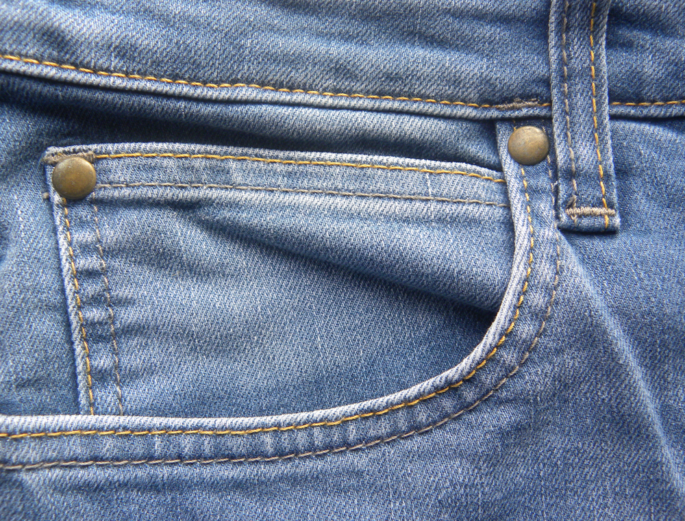 Why Jeans Have Tiny Metal Buttons Around Pockets?