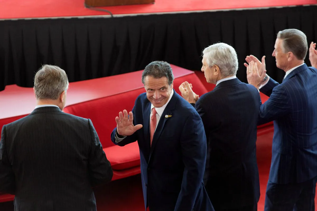 Gov. Andrew Cuomo greets attendees as he arrives at the new TWA Hotel at JFK Airport in New York City on May 15, 2019. (Kevin Hagen/Getty Images)