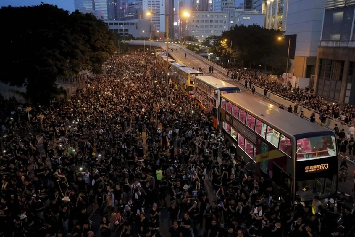 Protesters gather on a main road near the Legislative Council as they continue to protest against the unpopular extradition bill in Hong Kong on June 16, 2018. The largely youth-driven movement challenging Hong Kong's government over an unpopular extradition law is a coalition operating without a clear leadership structure. And that adds to its appeal for supporters disaffected from the moneyed elites who run the former British colony, organizers say. (Kin Cheung/AP)
