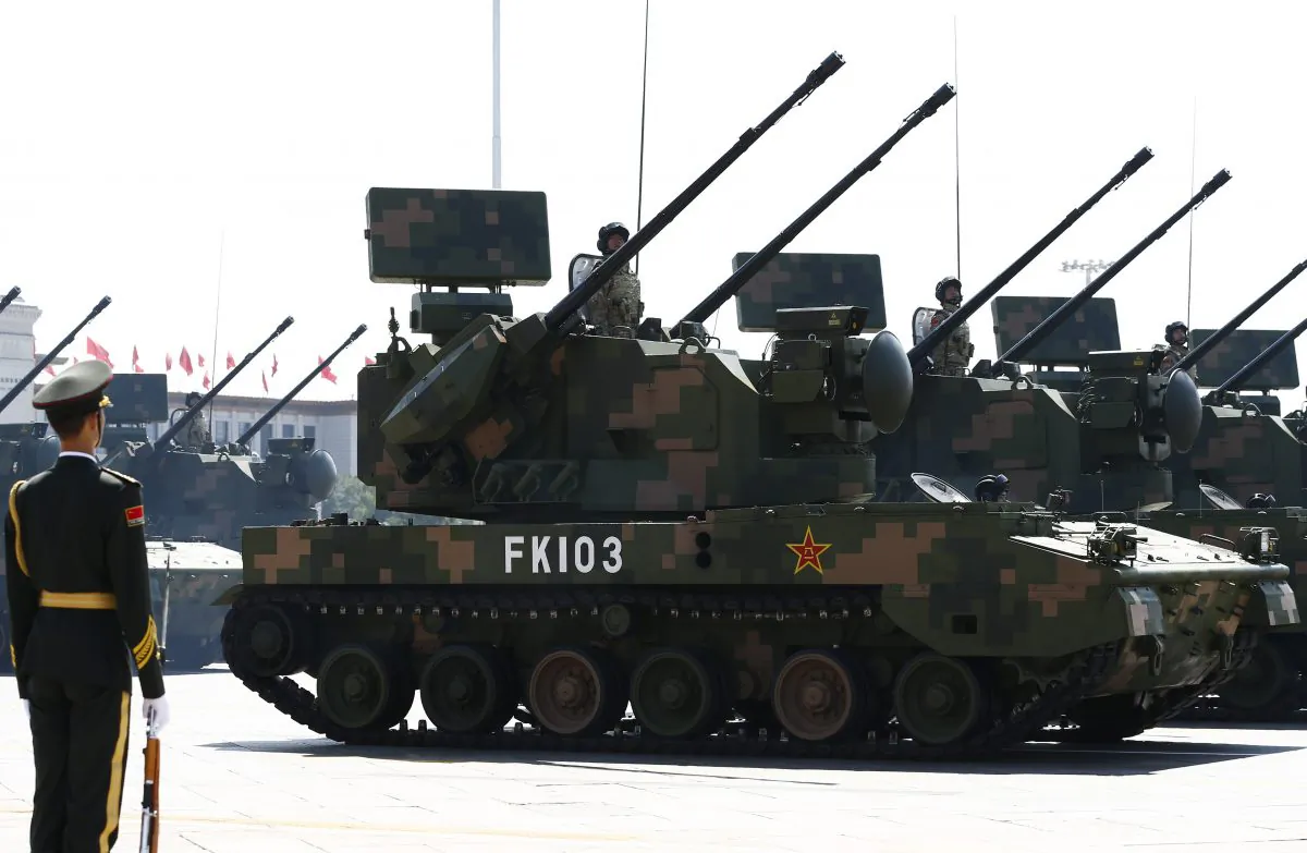 PGZ-07 self-propelled anti-aircraft artillery vehicles drive past the Tiananmen Gate during a military parade in Beijing on Sept. 3, 2015. (Getty Images)