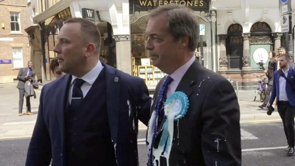 Brexit Party leader Nigel Farage after being hit with a milkshake during a campaign walkabout for the European elections in Newcastle, United Kingdom, on May 20, 2019. (Tom Wilkinson/PA via AP)
