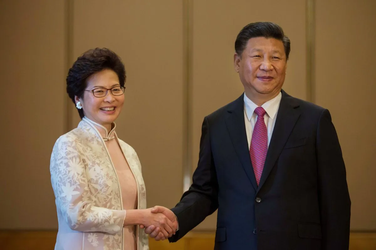Chinese leader Xi Jinping (R) shakes hands with Hong Kong's new Chief Executive Carrie Lam (L) during their meeting in Hong Kong on July 1, 2017.
(Billy H.C. Kwok/AFP/Getty Images)