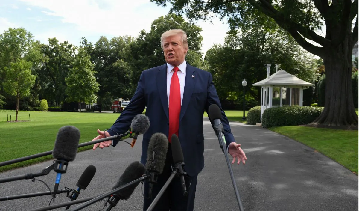President Donald Trump speaks to the press as he departs the White House on June 18, 2019. (JIM WATSON/AFP/Getty Images)
