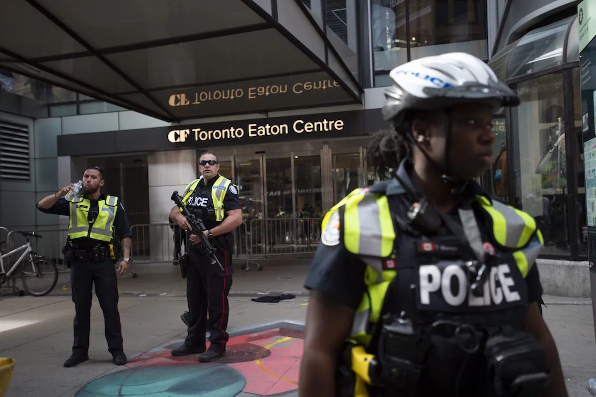 Toronto Police secure the scene where shots were fired during the Toronto Raptors NBA basketball championship parade in Toronto, on June 17, 2019. (Andrew Lahodynskyj/The Canadian Press via AP)